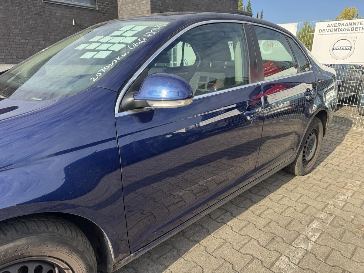 VW Jetta 1K2 original T&uuml;r vorn links LD5Q Shadow Blue Rohbau Bj.2009